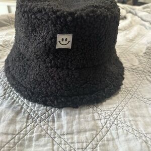 Black Smiley Face Sherpa Bucket Hat
